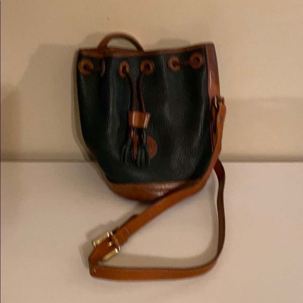 Vintage dark green and brown Dooney and bourke
